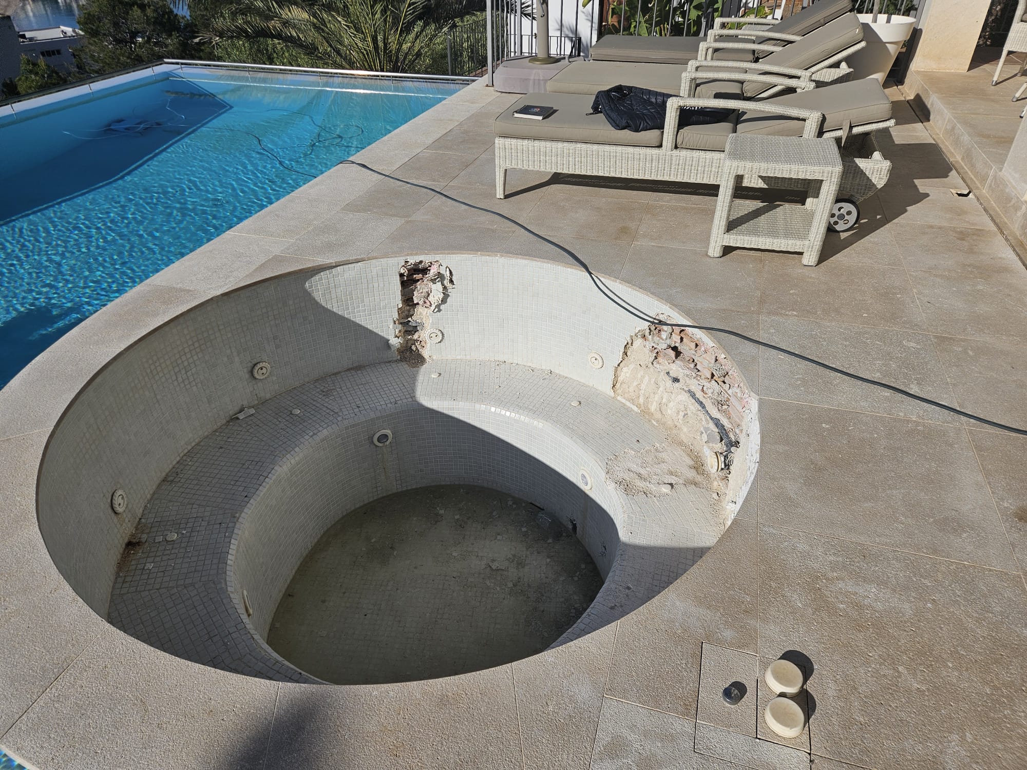 Old stone jacuzzi before renovation in Santa Ponsa